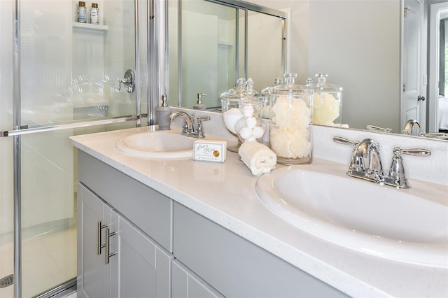 12435 Gust Ct, Hudson, FL 34669 - full bathroom featuring double vanity and a stall shower