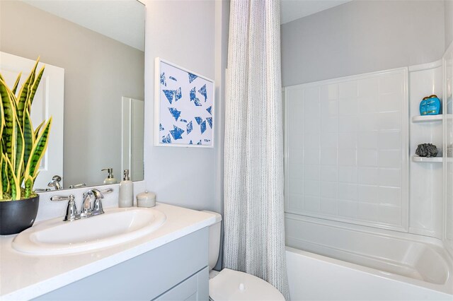 12435 Gust Ct, Hudson, FL 34669 - full bath featuring vanity, toilet, and shower / bathtub combination with curtain