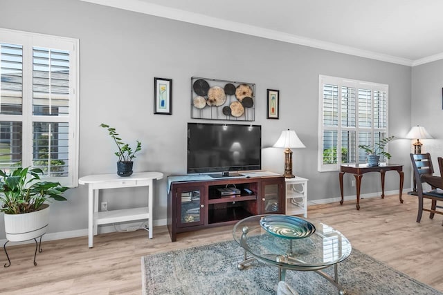 1110 Jasmine Creek Ct, Sun City Center, FL 33573 - living room featuring crown molding, baseboards, and wood finished floors