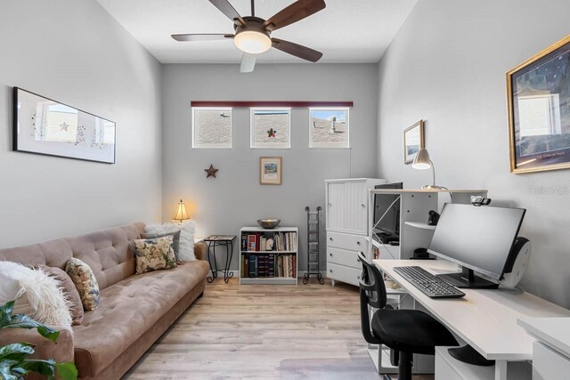 1110 Jasmine Creek Ct, Sun City Center, FL 33573 - office area with ceiling fan and light wood finished floors
