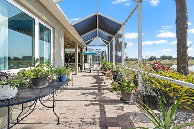 1110 Jasmine Creek Ct, Sun City Center, FL 33573 - view of patio featuring a ceiling fan and a water view