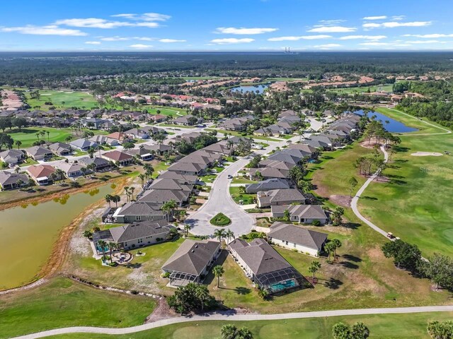 1110 Jasmine Creek Ct, Sun City Center, FL 33573 - aerial view of property's location featuring nearby suburban area, a nearby body of water, and a golf club