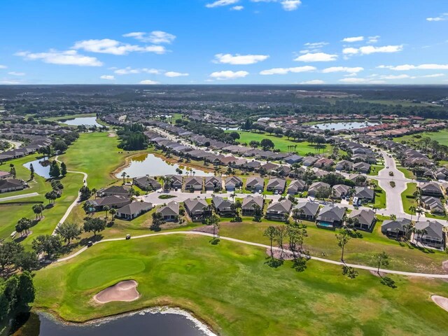 1110 Jasmine Creek Ct, Sun City Center, FL 33573 - view of property location featuring a large body of water, nearby suburban area, and a golf course