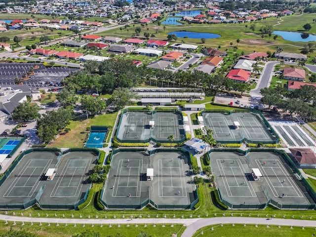 1110 Jasmine Creek Ct, Sun City Center, FL 33573 - aerial overview of property's location featuring a nearby body of water, nearby suburban area, and a golf club