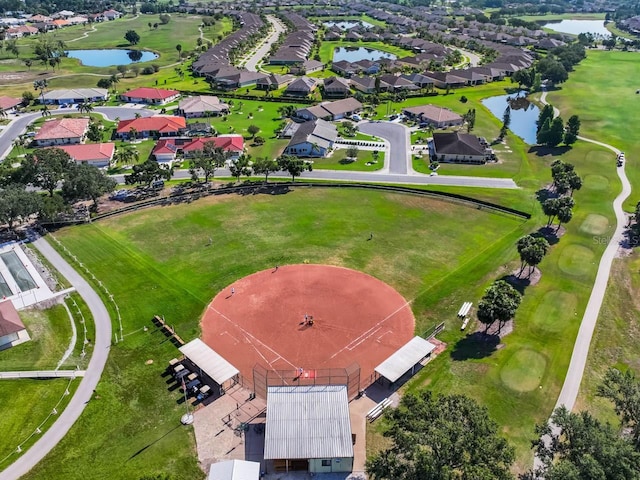 1110 Jasmine Creek Ct, Sun City Center, FL 33573 - aerial perspective of suburban area with a nearby body of water and a golf course
