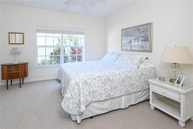 14840 Shipwatch Trce Unit 1924, Largo, FL 33774 - carpeted bedroom featuring baseboards and ceiling fan