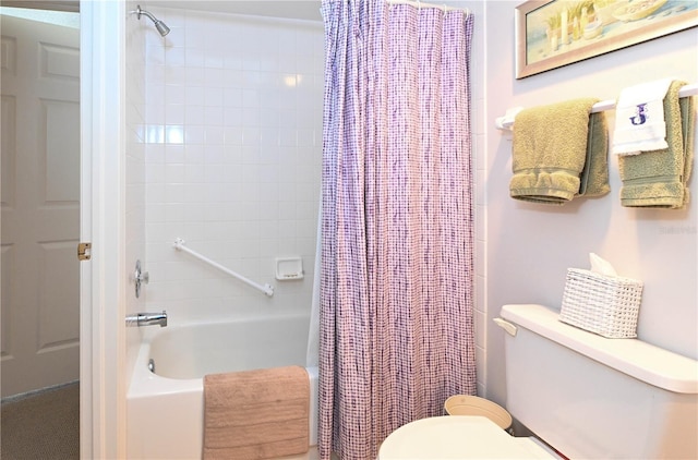 14840 Shipwatch Trce Unit 1924, Largo, FL 33774 - bathroom with shower / bathtub combination with curtain and toilet