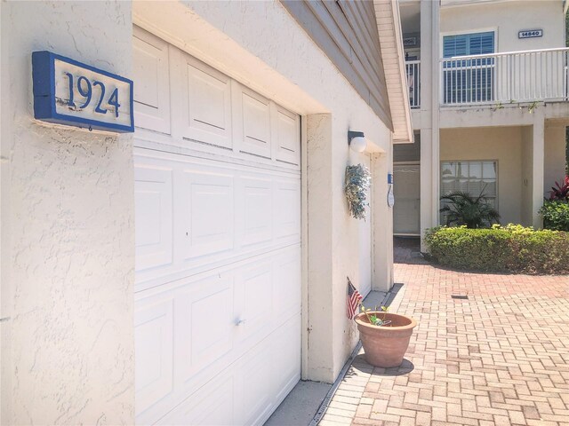14840 Shipwatch Trce Unit 1924, Largo, FL 33774 - view of exterior entry with stucco siding