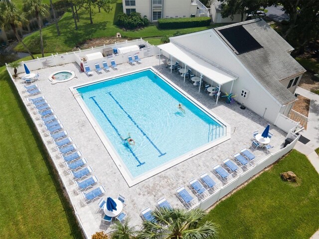 14840 Shipwatch Trce Unit 1924, Largo, FL 33774 - community pool with a patio area