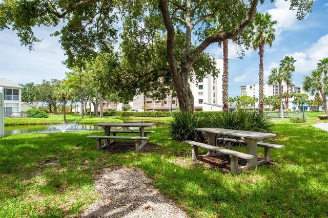 14840 Shipwatch Trce Unit 1924, Largo, FL 33774 - view of property's community featuring a yard and a water view