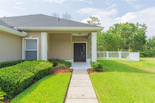 20403 Sultana Ct, Tampa, FL 33647 - entrance to property featuring a shingled roof and stucco siding