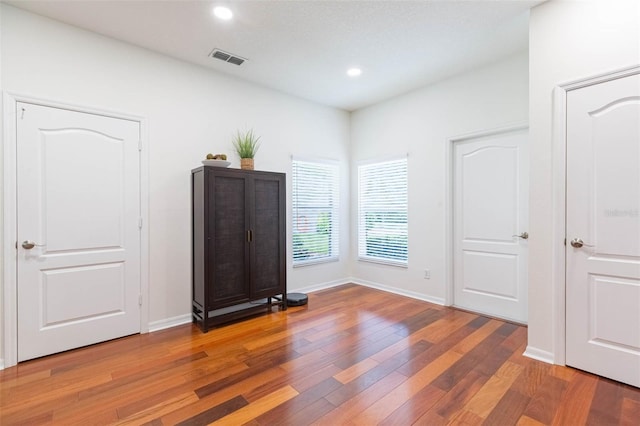 20403 Sultana Ct, Tampa, FL 33647 - unfurnished bedroom with wood finished floors, recessed lighting, and baseboards