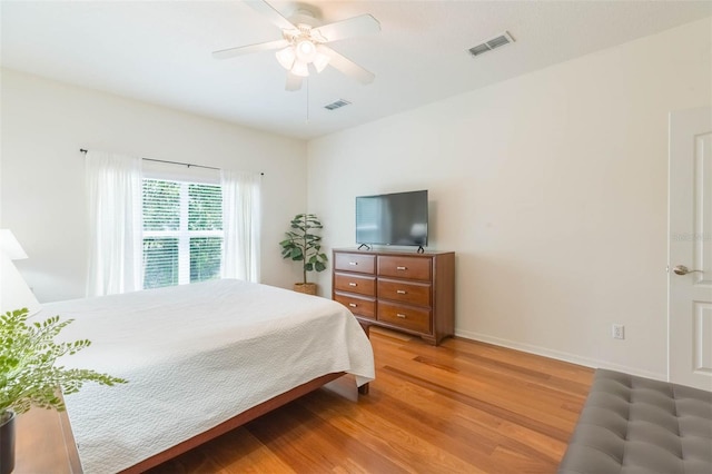 20403 Sultana Ct, Tampa, FL 33647 - bedroom featuring wood finished floors, baseboards, and ceiling fan