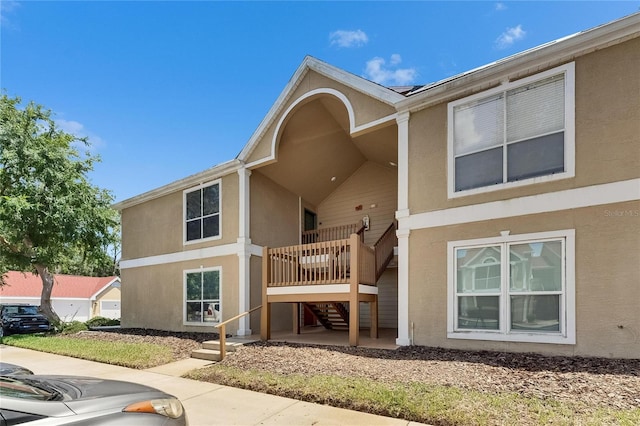 9481 Highland Oak Dr Unit 1511, Tampa, FL 33647 - view of side of home featuring stairway and stucco siding