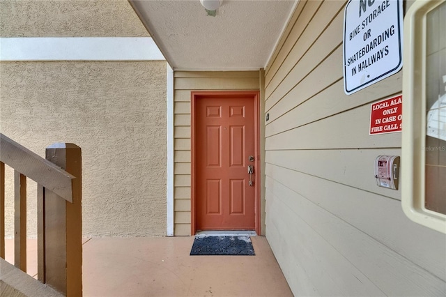 9481 Highland Oak Dr Unit 1511, Tampa, FL 33647 - property entrance with stucco siding