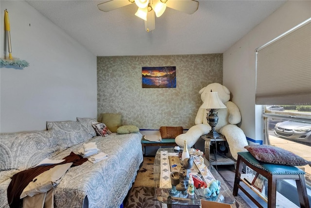 9481 Highland Oak Dr Unit 1511, Tampa, FL 33647 - bedroom with wallpapered walls and ceiling fan