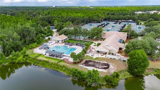 9481 Highland Oak Dr Unit 1511, Tampa, FL 33647 - bird's eye view of a heavily wooded area, a pool, and a large body of water
