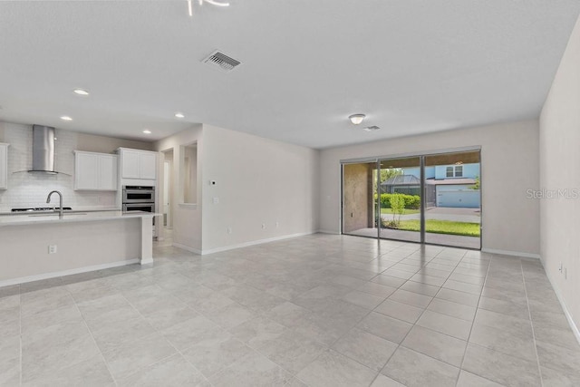2280 Long Spur, Odessa, FL 33556 - unfurnished living room with baseboards, light tile patterned floors, and recessed lighting
