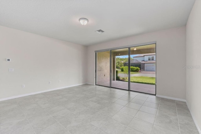 2280 Long Spur, Odessa, FL 33556 - unfurnished room featuring baseboards and light tile patterned floors