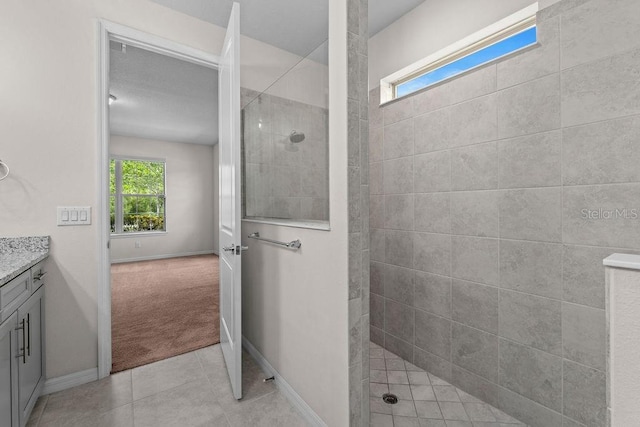 2280 Long Spur, Odessa, FL 33556 - full bathroom featuring a walk in shower, vanity, tile patterned floors, and baseboards