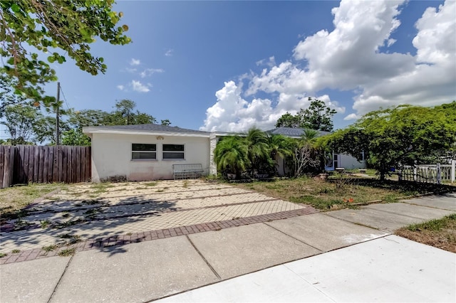 1242 Bermuda St, Clearwater, FL 33755 - view of front of property with stucco siding