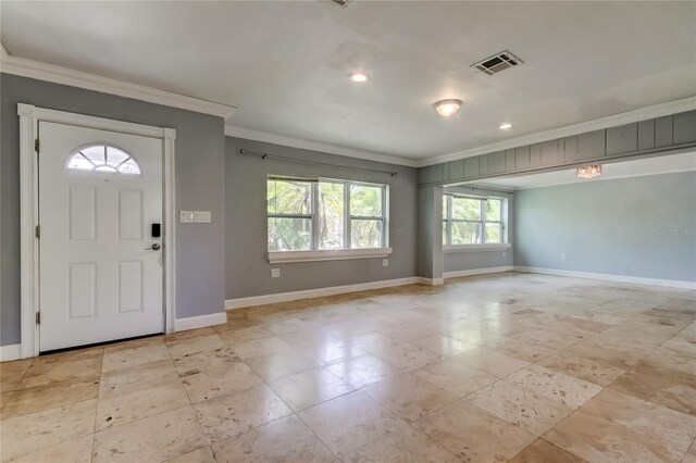 1242 Bermuda St, Clearwater, FL 33755 - foyer entrance featuring ornamental molding, baseboards, and recessed lighting