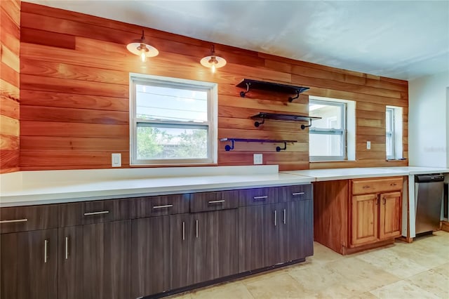 1242 Bermuda St, Clearwater, FL 33755 - kitchen featuring light countertops, wood walls, and open shelves