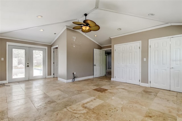 1242 Bermuda St, Clearwater, FL 33755 - unfurnished bedroom featuring ornamental molding, lofted ceiling, access to outside, two closets, and baseboards