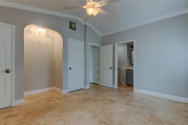 1242 Bermuda St, Clearwater, FL 33755 - unfurnished bedroom featuring arched walkways, crown molding, vaulted ceiling, baseboards, and a ceiling fan