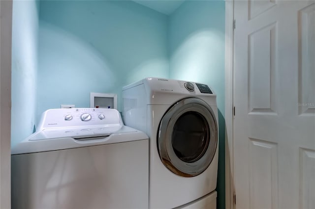 1242 Bermuda St, Clearwater, FL 33755 - laundry room with washer and dryer