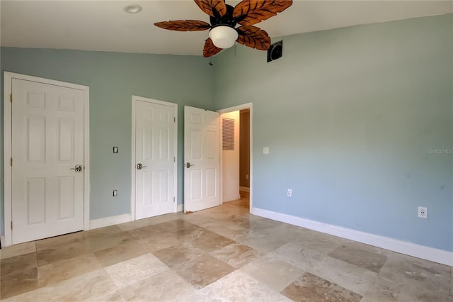 1242 Bermuda St, Clearwater, FL 33755 - unfurnished bedroom with high vaulted ceiling, baseboards, and a ceiling fan