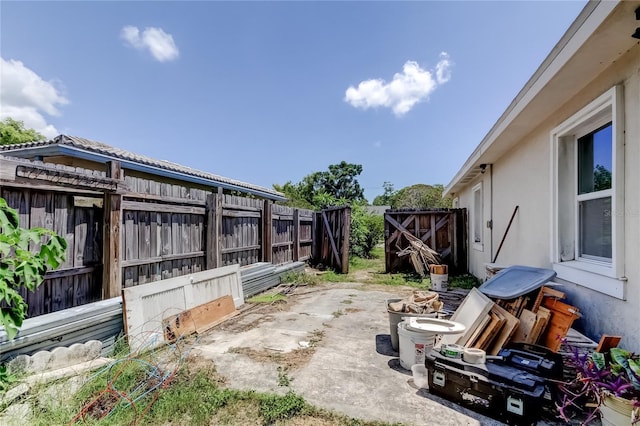 1242 Bermuda St, Clearwater, FL 33755 - fenced backyard featuring a patio area