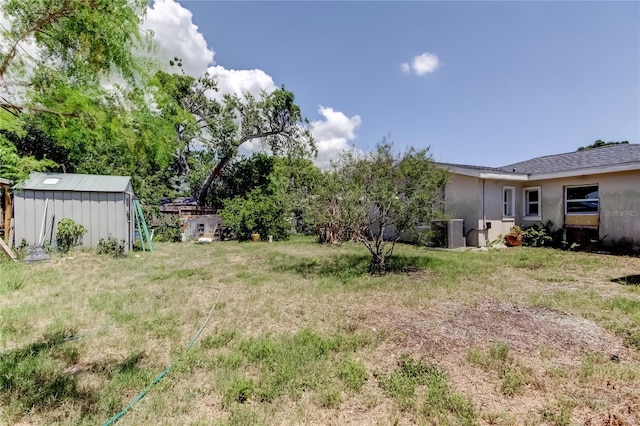 1242 Bermuda St, Clearwater, FL 33755 - view of yard featuring central air condition unit