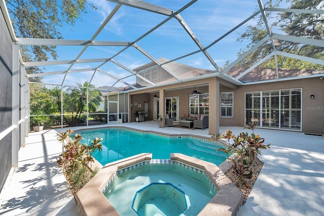 5704 Eaglemount Cir, Lithia, FL 33547 - view of pool featuring a ceiling fan, a patio area, outdoor lounge area, a pool with connected hot tub, and a lanai