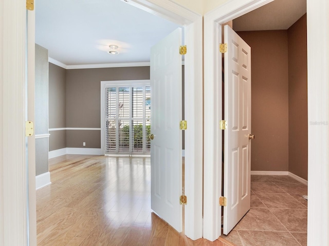 10504 Echo Lake Dr, Odessa, FL 33556 - corridor with baseboards, crown molding, and light wood finished floors