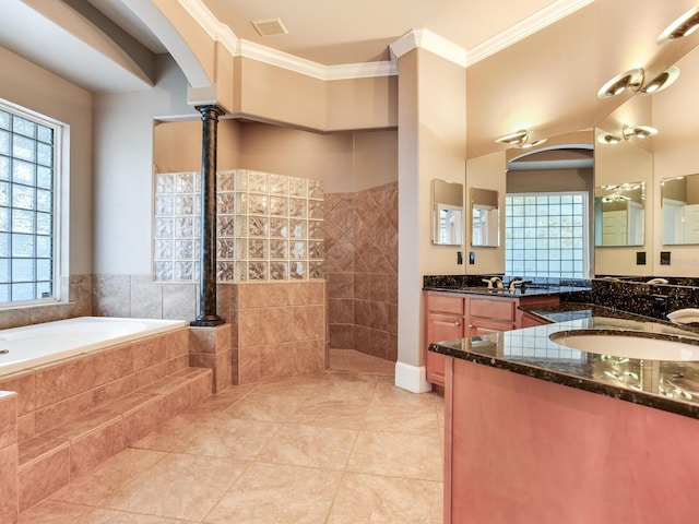 10504 Echo Lake Dr, Odessa, FL 33556 - full bath with crown molding, a garden tub, two vanities, tile patterned flooring, and a walk in shower