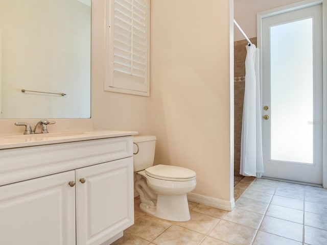 10504 Echo Lake Dr, Odessa, FL 33556 - bathroom with vanity, toilet, tile patterned flooring, and a shower with shower curtain