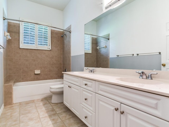 10504 Echo Lake Dr, Odessa, FL 33556 - full bath with double vanity, bathing tub / shower combination, toilet, and tile patterned floors