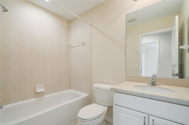 11839 Castine St, New Port Richey, FL 34654 - bathroom with toilet, vanity, and shower / bathtub combination
