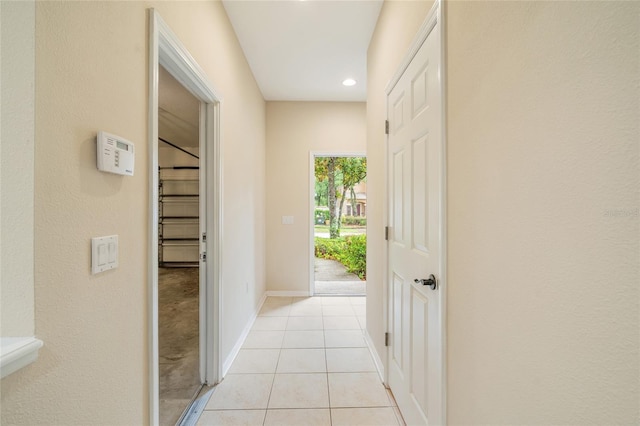 11839 Castine St, New Port Richey, FL 34654 - corridor featuring light tile patterned floors, recessed lighting, and baseboards