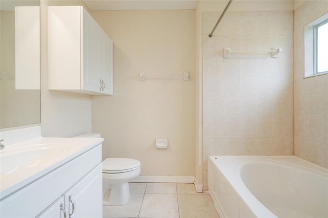 11839 Castine St, New Port Richey, FL 34654 - full bath with tile patterned flooring, vanity, toilet, baseboards, and  shower combination