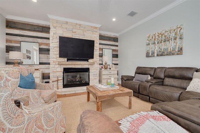 152 Glenn Moor Cir, Dunedin, FL 34698 - living room with crown molding, recessed lighting, and a fireplace
