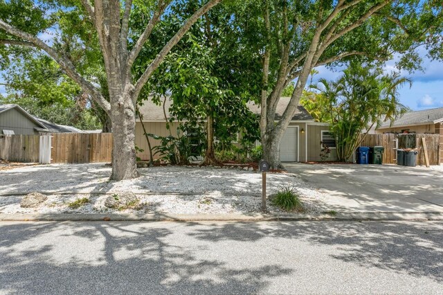 4021 Vana Dr, Sarasota, FL 34241 - obstructed view of property with a garage and driveway