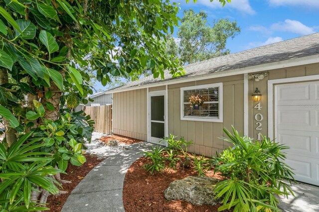 4021 Vana Dr, Sarasota, FL 34241 - view of exterior entry with roof with shingles