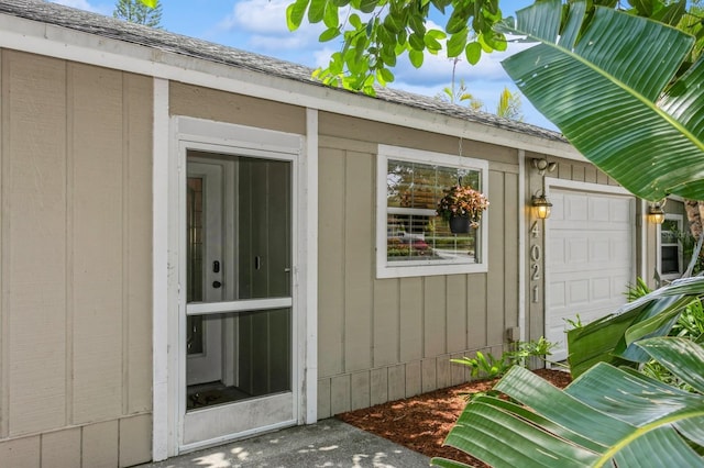 4021 Vana Dr, Sarasota, FL 34241 - view of exterior entry with a garage