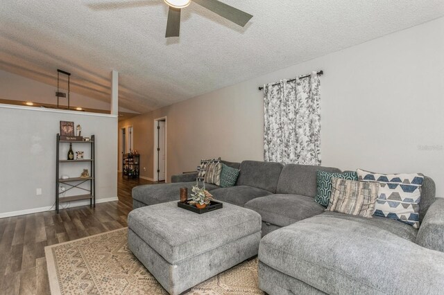 4021 Vana Dr, Sarasota, FL 34241 - living area with ceiling fan, wood finished floors, lofted ceiling, a textured ceiling, and baseboards