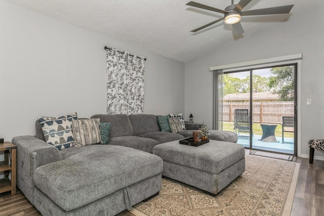 4021 Vana Dr, Sarasota, FL 34241 - living area with vaulted ceiling, ceiling fan, a textured ceiling, and wood finished floors