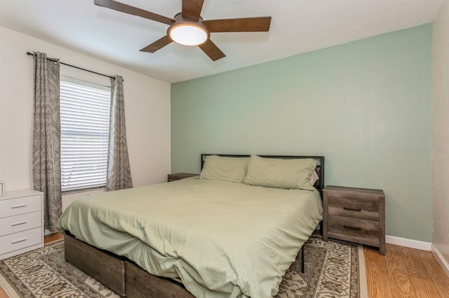 4021 Vana Dr, Sarasota, FL 34241 - bedroom featuring wood finished floors, baseboards, and a ceiling fan