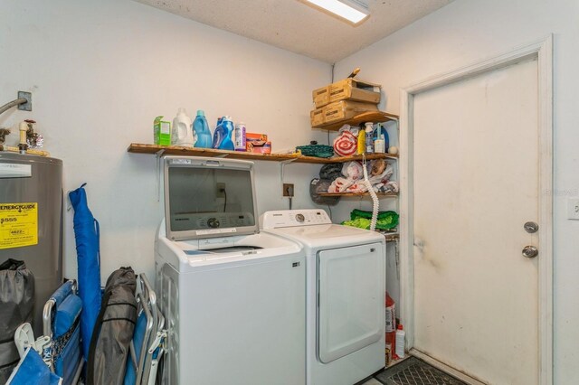 4021 Vana Dr, Sarasota, FL 34241 - laundry room featuring independent washer and dryer and electric water heater