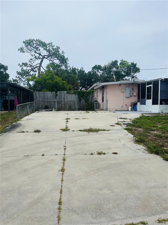 72 Lake Shore Dr, Palm Harbor, FL 34684 - view of yard featuring a sunroom